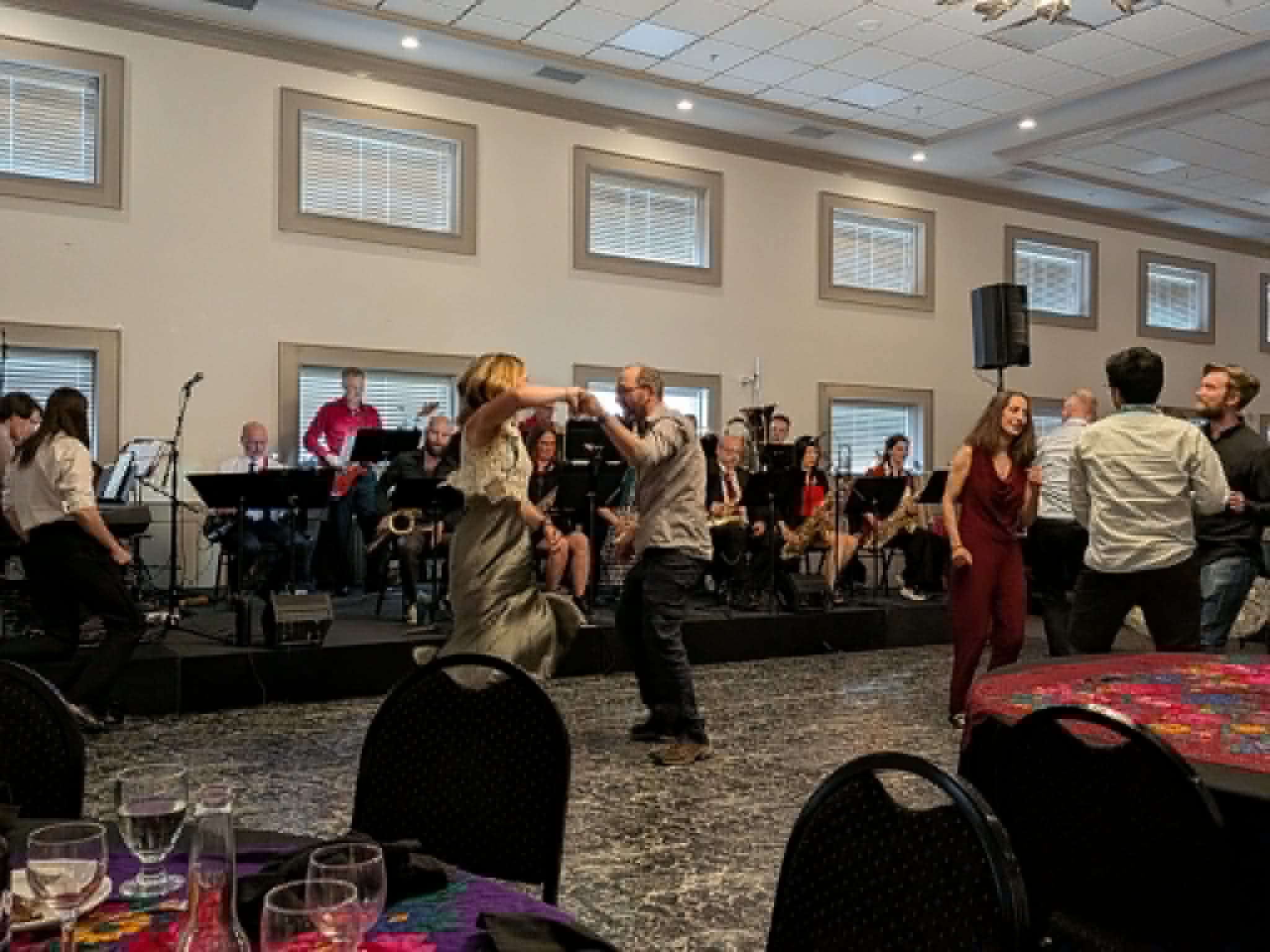 Photo: NACW attendees enjoying the Banquet and Swing Band.