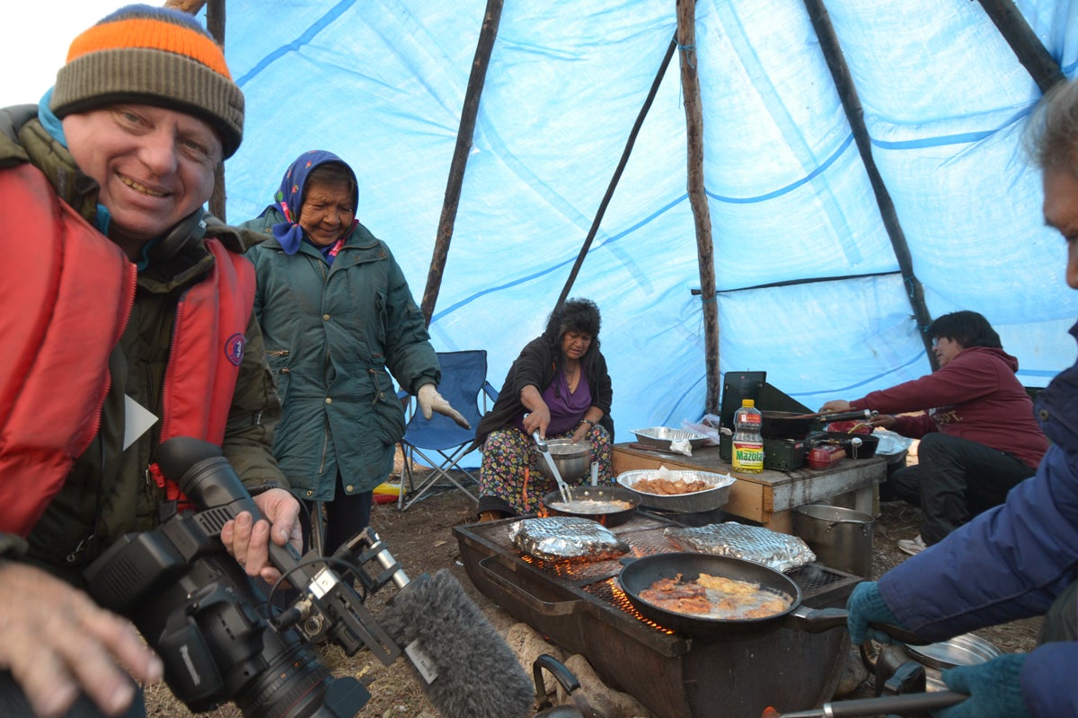 Alan Booth in kitchen tent (Photo:  Paul Vecsei, Golder Associates)