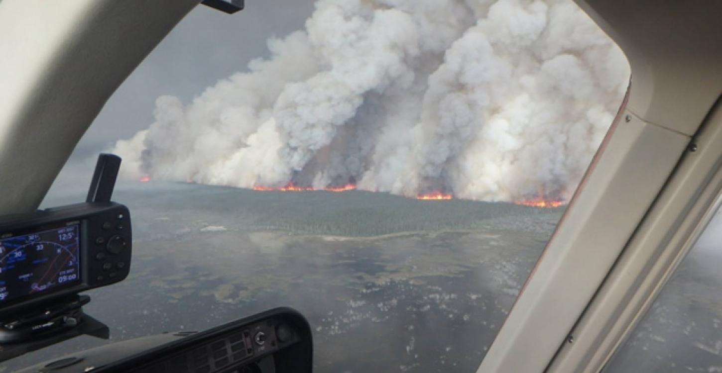 An aerial view of the Birch Creek Fire complex, 2014. Credit: NWTFire/Facebook, located on: https://www.climatecentral.org/news/nw-fires-weather-climate-change-boreal-forests-17778