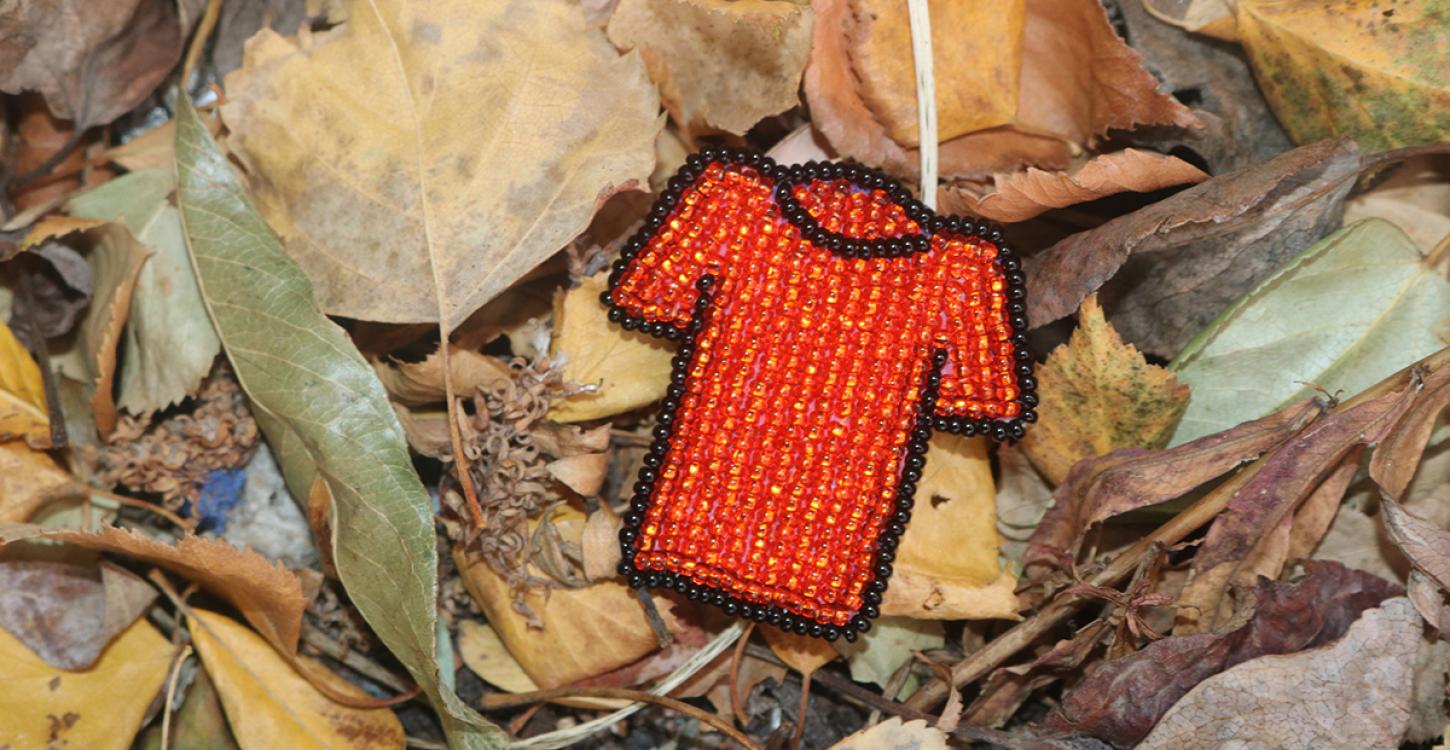 Orange Shirt Pin design courtesy of Tribal Roots. Photo credit: Simon Whitehouse