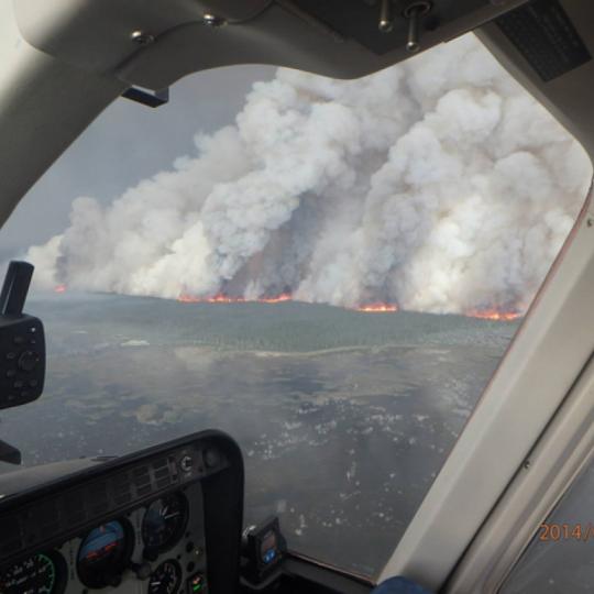 An aerial view of the Birch Creek Fire complex, 2014. Credit: NWTFire/Facebook, located on: https://www.climatecentral.org/news/nw-fires-weather-climate-change-boreal-forests-17778