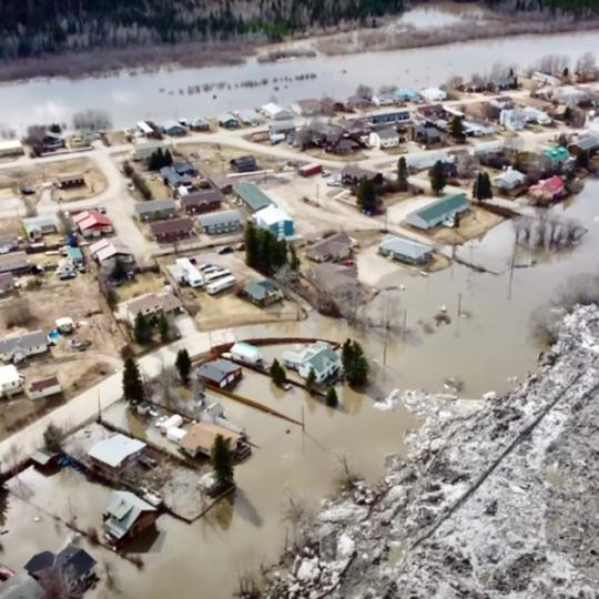 Photo credit: Flooding in Fort Simpson on May 12, 2021. FearFighters Mech Drones 3DP Gaming/YouTube https://cabinradio.ca/66605/news/dehcho/nwt-will-cover-all-repairs-for-flood-affected-residents/