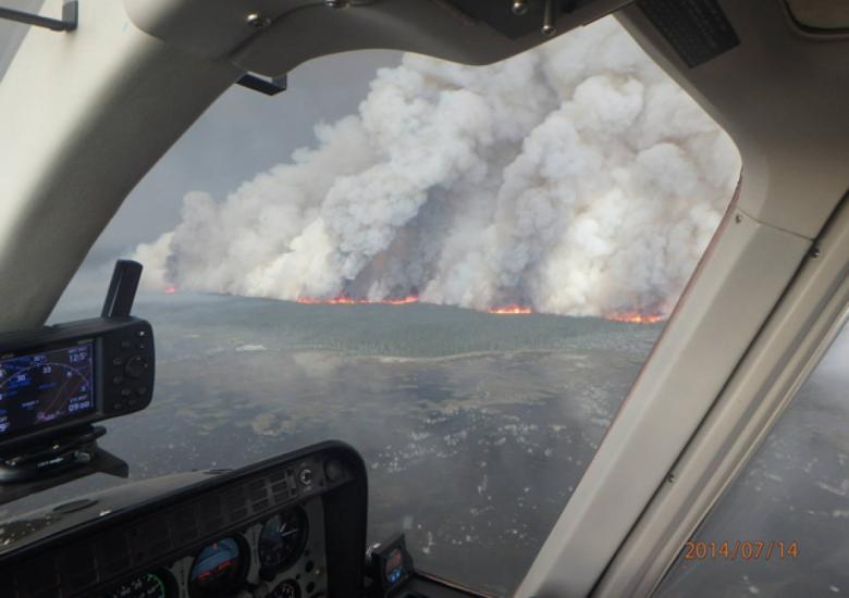 An aerial view of the Birch Creek Fire complex, 2014. Credit: NWTFire/Facebook, located on: https://www.climatecentral.org/news/nw-fires-weather-climate-change-boreal-forests-17778