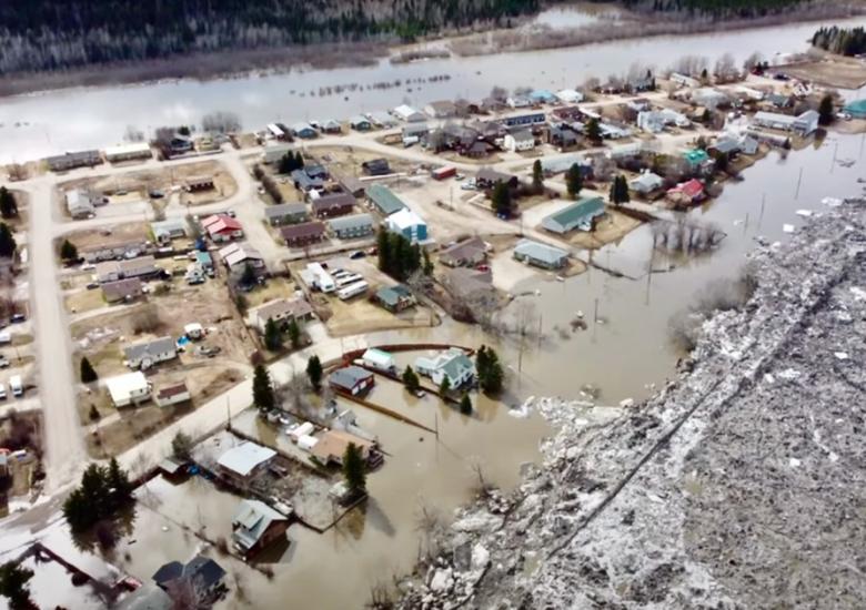 Photo credit: Flooding in Fort Simpson on May 12, 2021. FearFighters Mech Drones 3DP Gaming/YouTube https://cabinradio.ca/66605/news/dehcho/nwt-will-cover-all-repairs-for-flood-affected-residents/