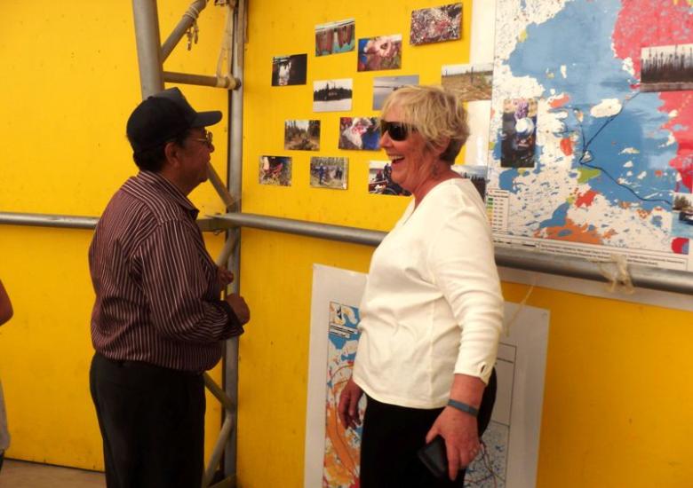 Dr. Allice Legat describing research underway on the effects of forest fires on caribou habitat.  (Photo: Jennifer Baltzer)